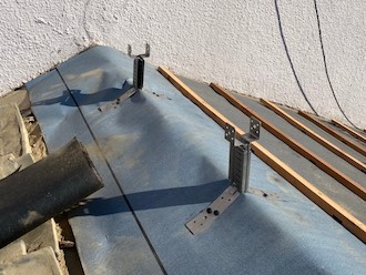 心木を取り付ける金具