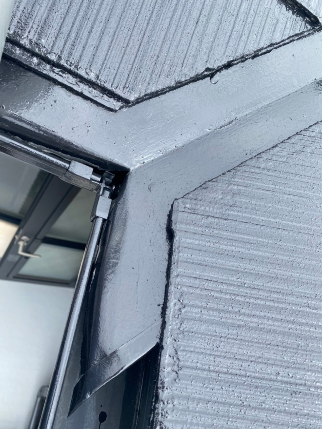 守山区で谷板金の不具合から樋がオーバーフロー